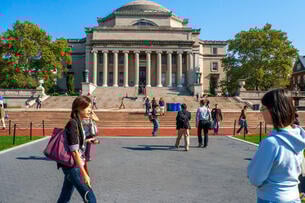 Students walk on Columbia University's campus. 