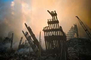 The smoldering rubble of the World Trade Center the day after the Sept. 11 terrorist attacks. 